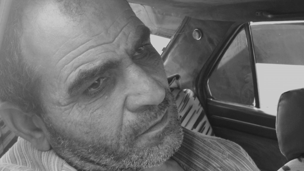 still from Blind Ambition (the man in the car)